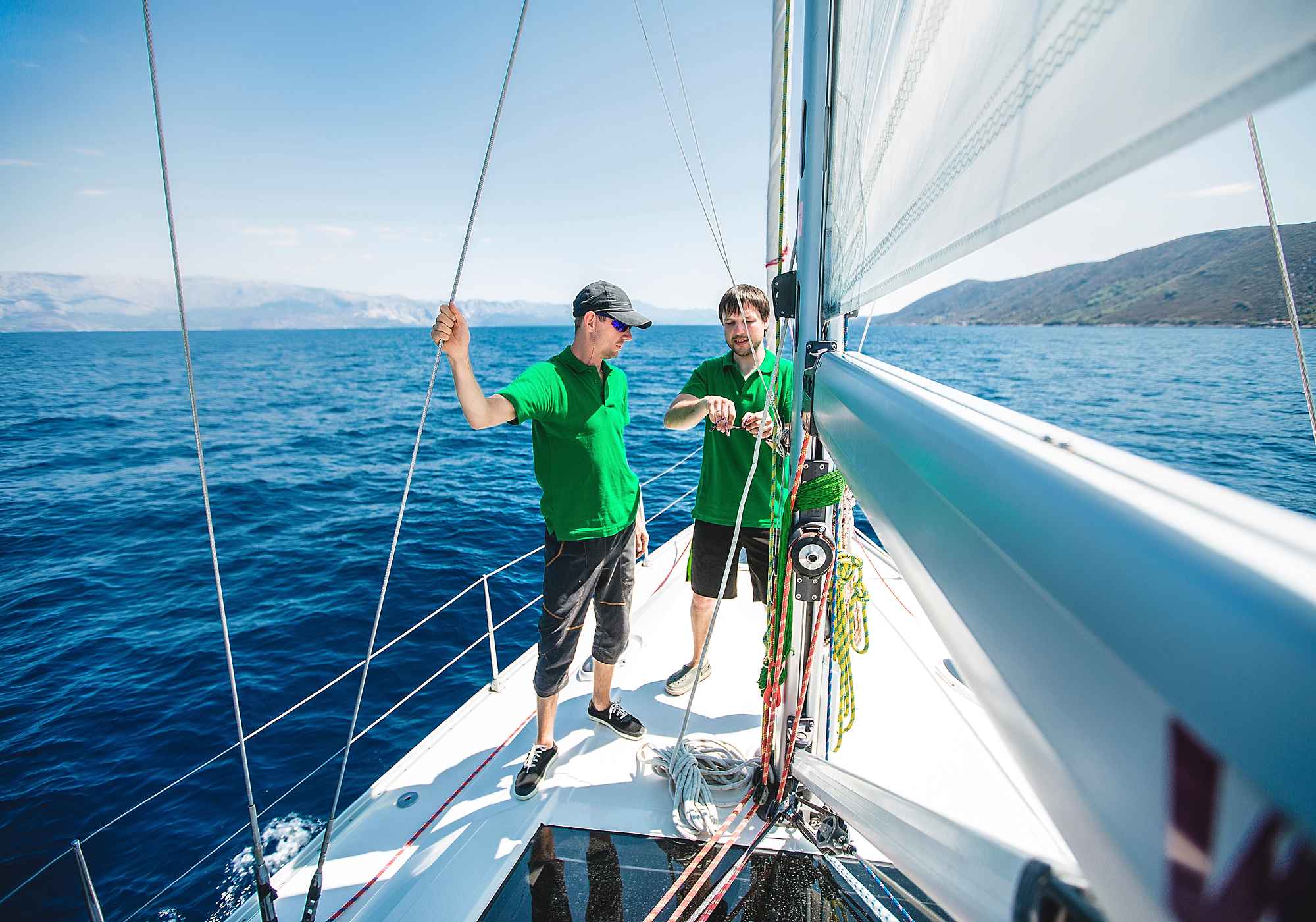 twos-men-yachting-near-coast-croatia-6JN5GRT.jpg